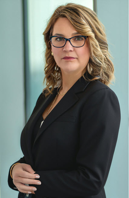 Caroline Maynard looking at camera